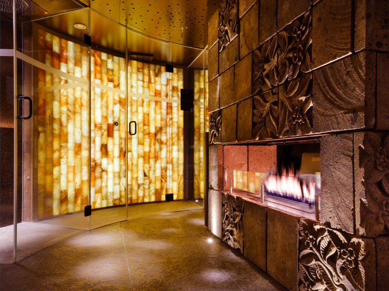 Interior view of Cloud Twelve showing a refined lounge area in Notting Hill, featuring soft lighting, natural textures, and a wellness-focused design aesthetic.