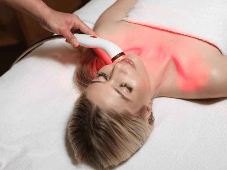 LED light therapy device being used during facial at Cloud Twelve spa in London